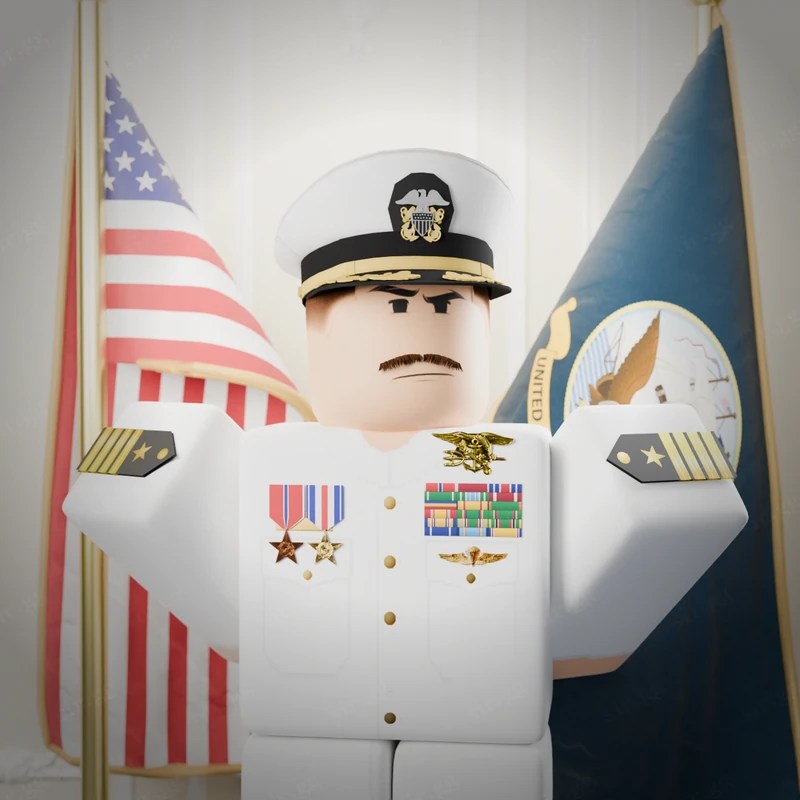 Naval officer in white dress uniform standing in front of flags